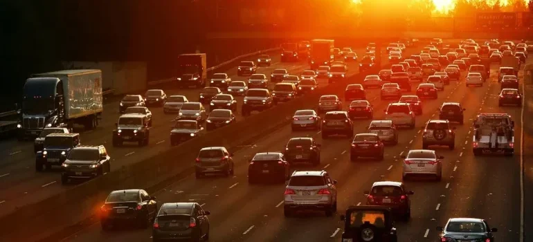 Traffic-packed Los Angeles highway during summer, highlighting the difficulty of moving during peak season