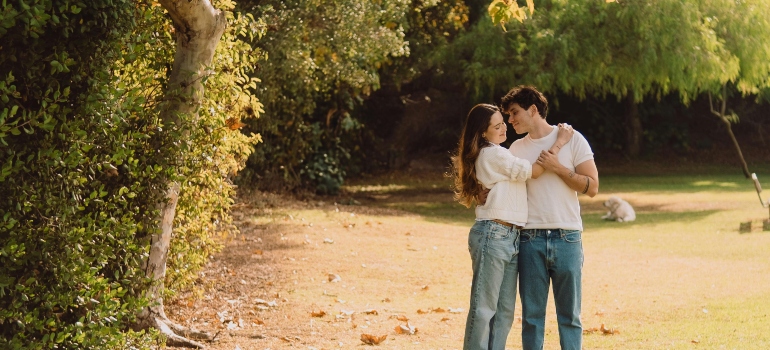 A couple is enjoying themselves at the park. 