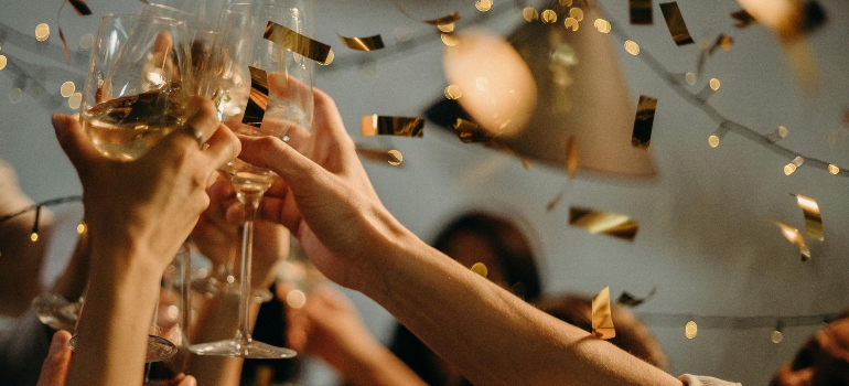People Toasting Wine Glasses