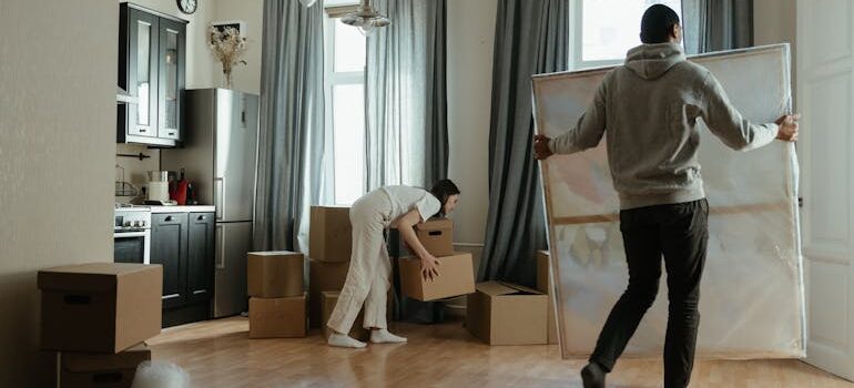 man moving a painting