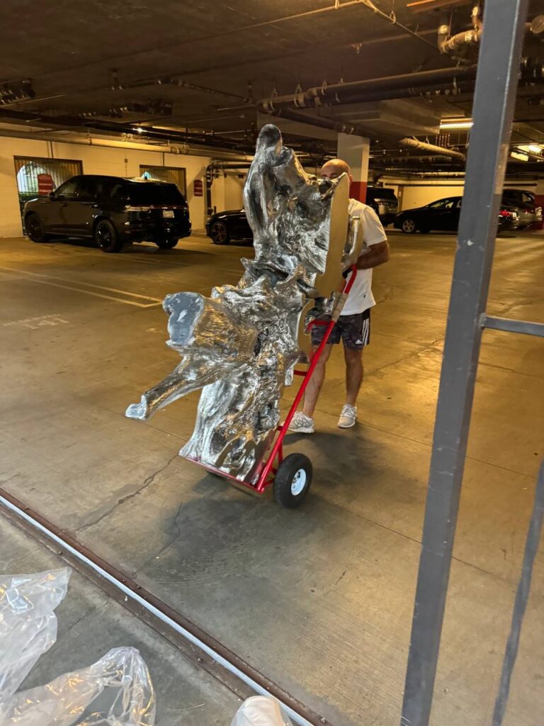 Team carefully handling furniture during a local move