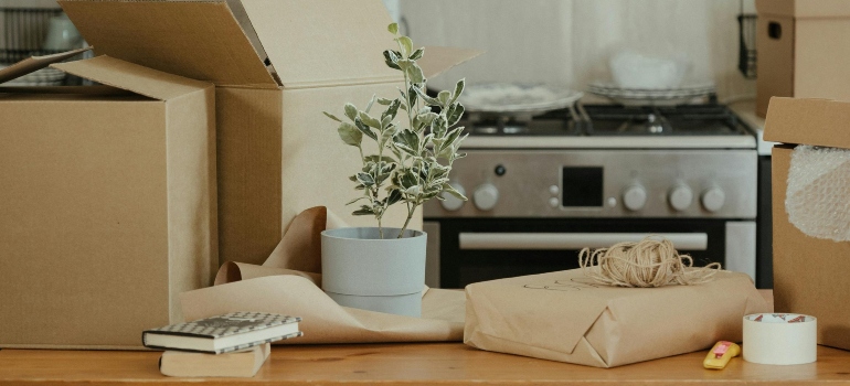 Cardboard boxes on the table, carefully packed by moving companies in Marina Del Rey.