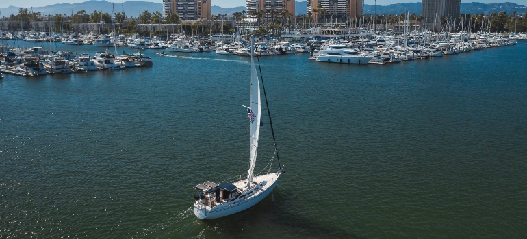 White sailboat on the ocean.