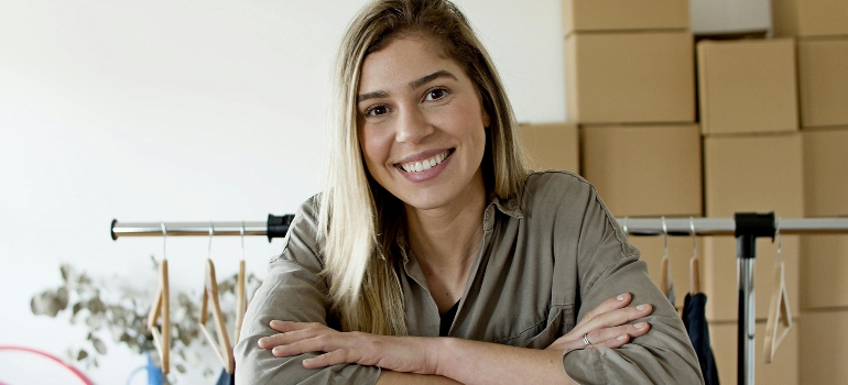 Woman in Gray Long Sleeve Shirt Smiling