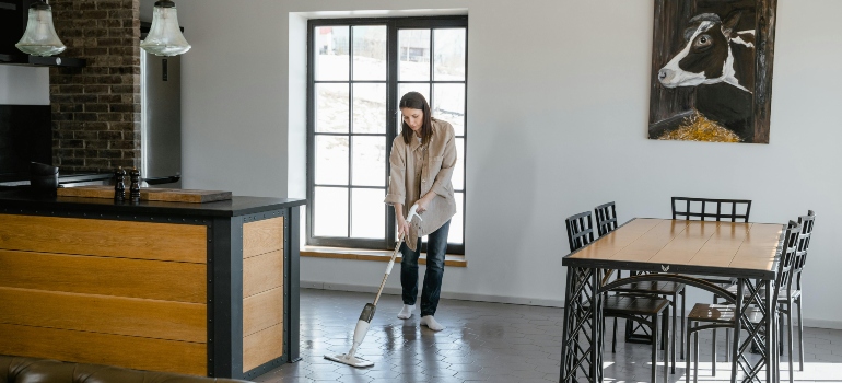 A Woman Cleaning the Floor
