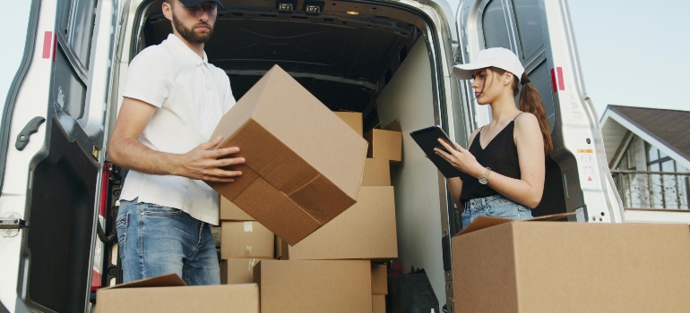a boy and girl holding boxes for moving companies South Pasadena