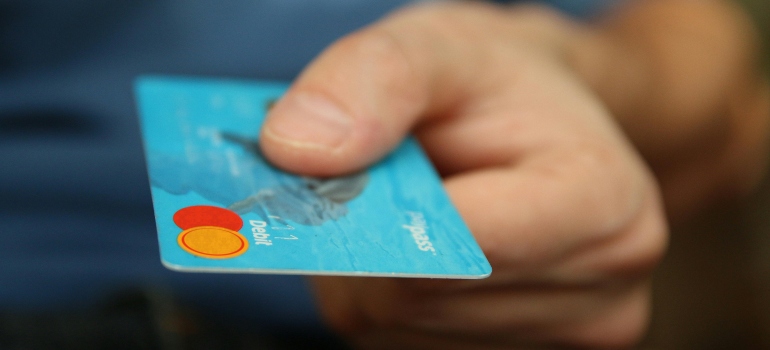 Credit card symbolizing affordable moving services and free quote options in Torrance, CA.
