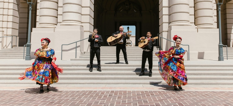 Mariachi band and dancers performing in front of Pasadena City Hall, showcasing Why Families Are Moving to Pasadena in 2025.