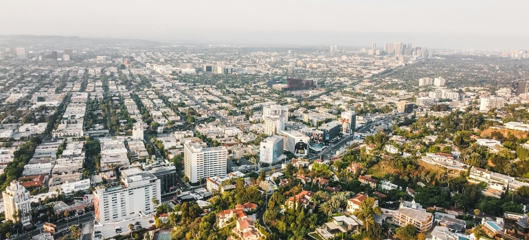 flying and calculating the cost of moving to Beverly Hills